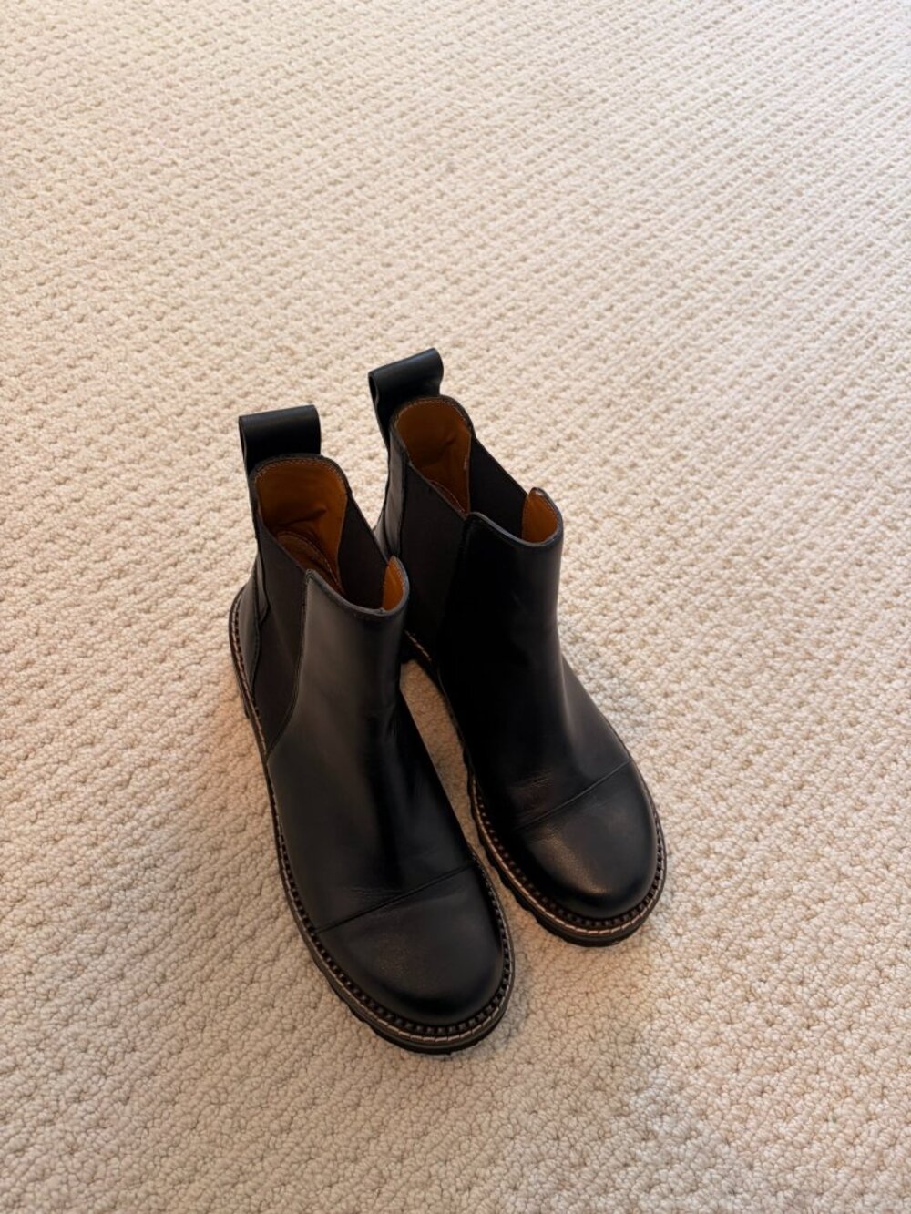 See By Chloe black leather boots by Chloé Black Leather Chelsea Lug Sole